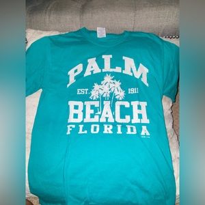 Teal blue. Palm Beach Florida T-shirt. With white lettering.